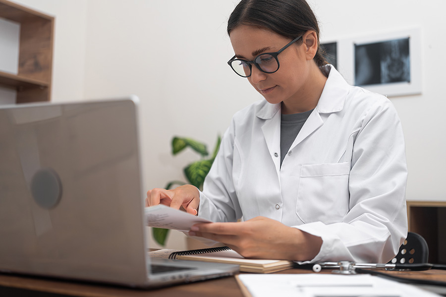 Bookkeeping for Medical Practices - records being reviewed by a clinic practitioner