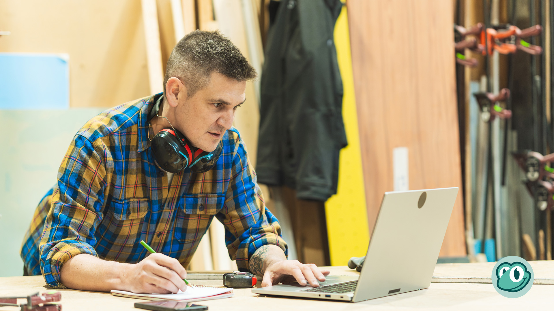 Tradie business bookkeeeping owner reviewing bookkeeping and business finances